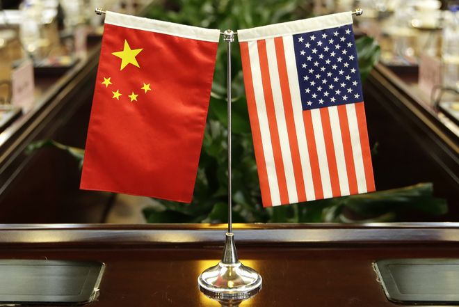 特朗普罕见亲迎习主席 外媒热议中美元首会晤